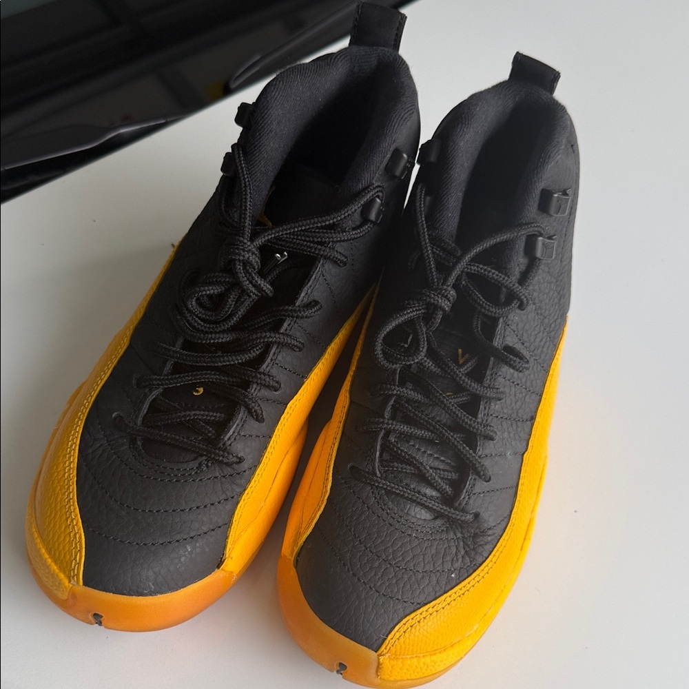 Jordan Black and Gold Sneakers